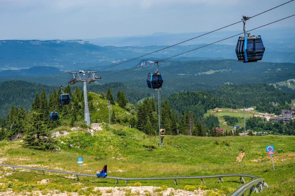 Summer gondolas above the meadows